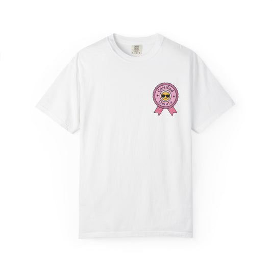 Certified Delulu Badge Comfort Tee displayed on a mannequin, showcasing its soft-washed fabric and relaxed fit, perfect for embracing your emotional support uniform.
