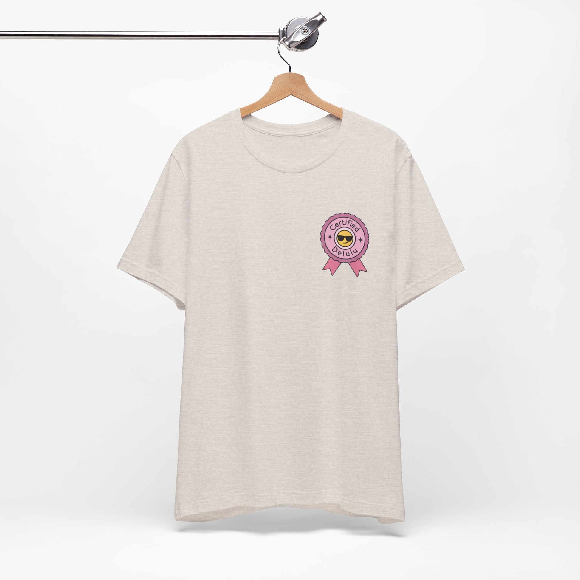 Eco-friendly Certified Delulu Badge Unisex Tee; a sustainable delulu badge shirt for the conscious consumer.