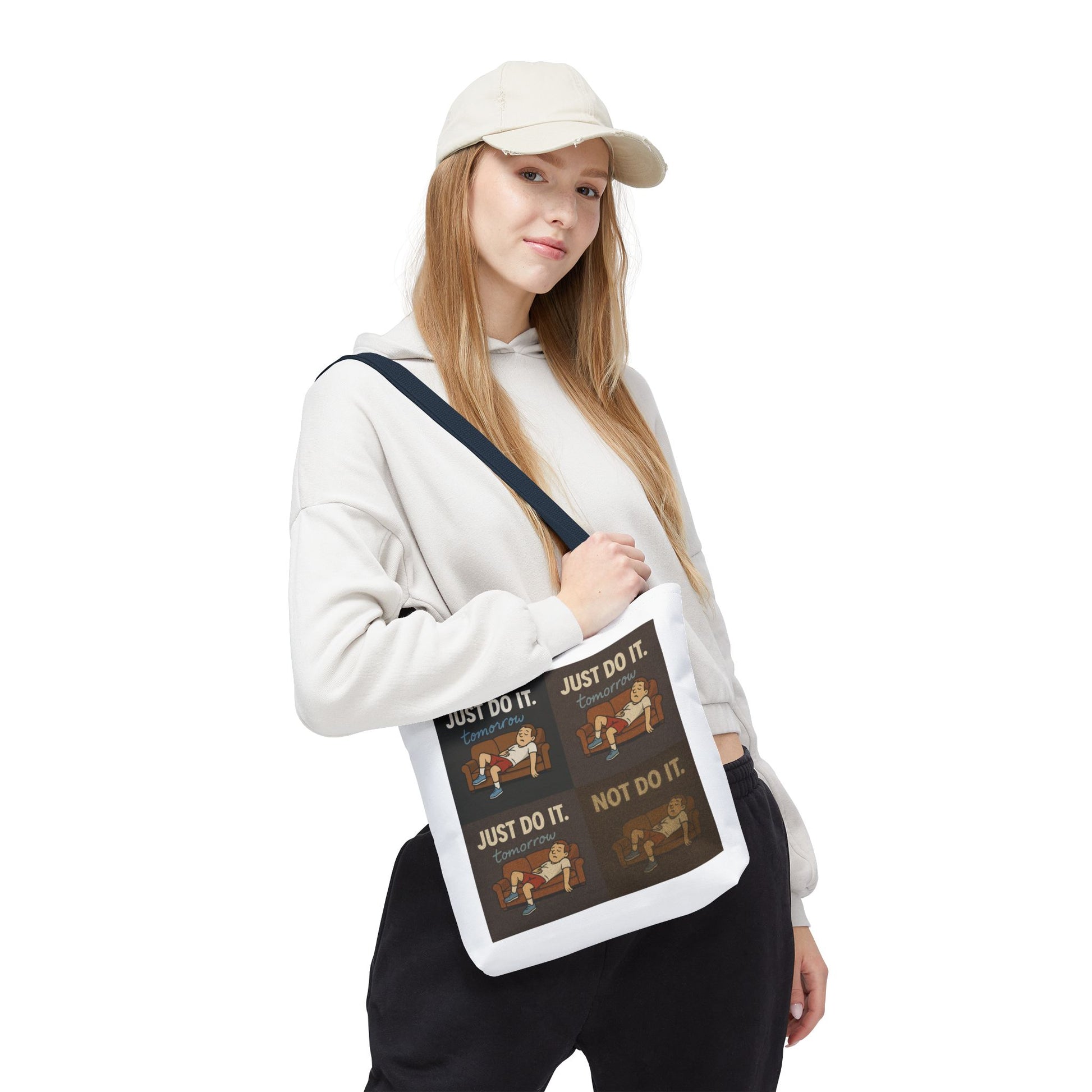 Fun perspective of 'Just Do It… Tomorrow' tote bag looking ready for a lazy day out.