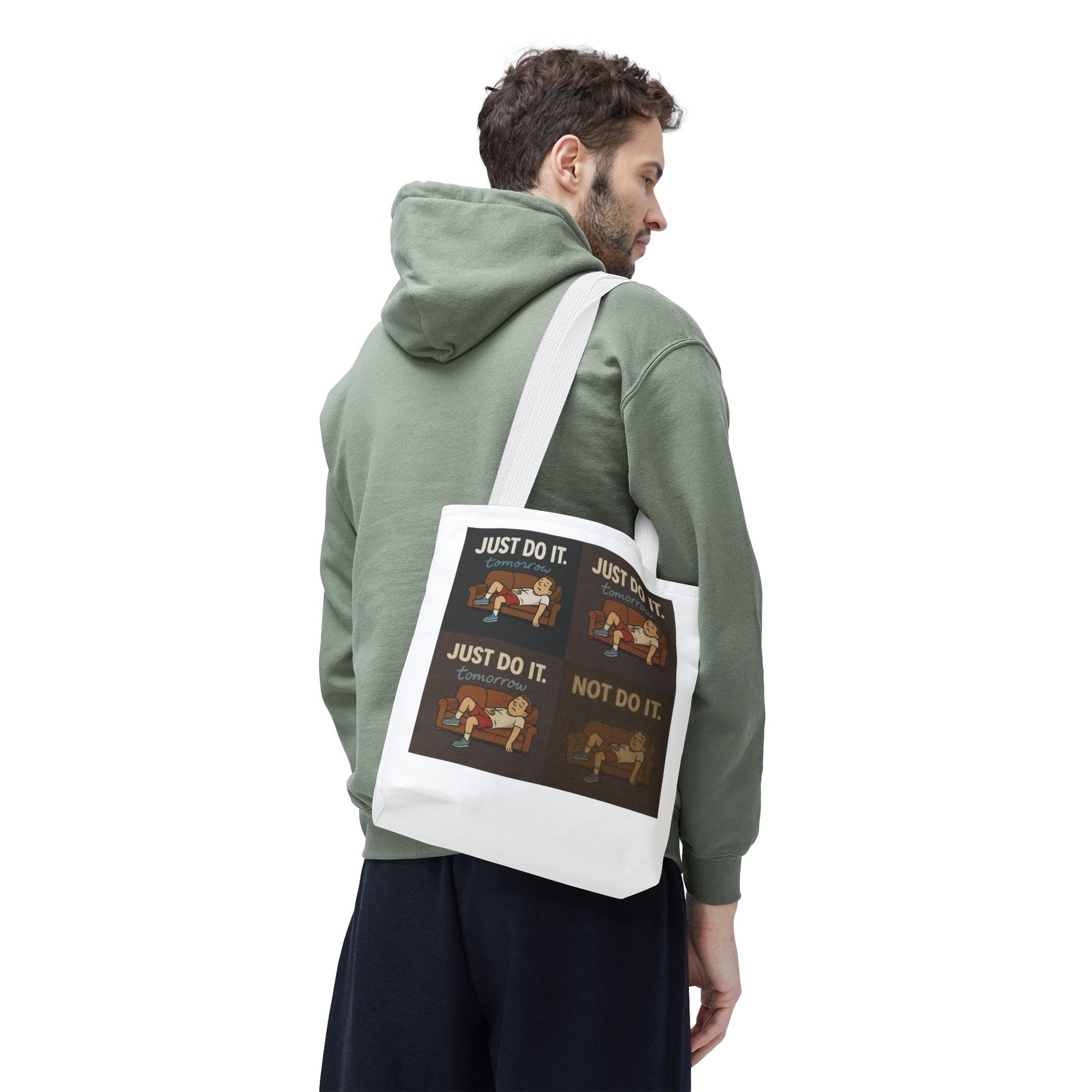 Creative workspace featuring 'Just Do It… Tomorrow' tote bag with chill accessories.