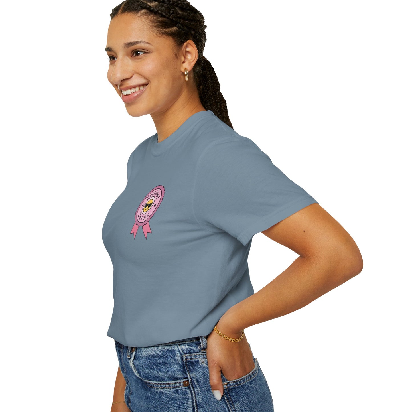 Hands showcasing the softness of the Certified Delulu Badge Comfort Tee fabric, a quintessential choice for daily comfort and humorous style.