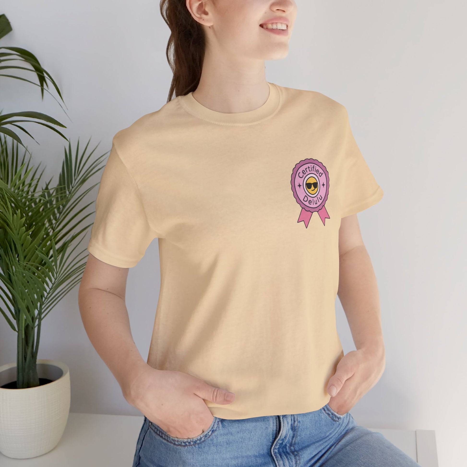 Certified Delulu Badge Unisex Tee; a humorous delulu badge shirt for every overthinker in your friend group.