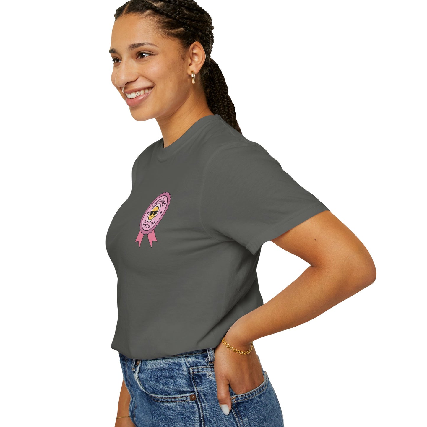 Certified Delulu Badge Comfort Tee alongside a whimsical quote, inspiring laughter and optimism for all who dare to wear it.