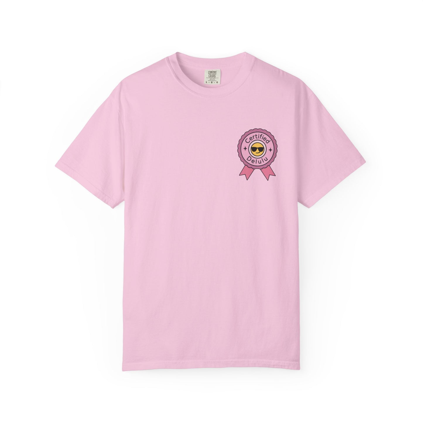 The Certified Delulu Badge Comfort Tee strewn casually on a chair, inviting overthinkers to embrace their inner main character in this stylish outfit.
