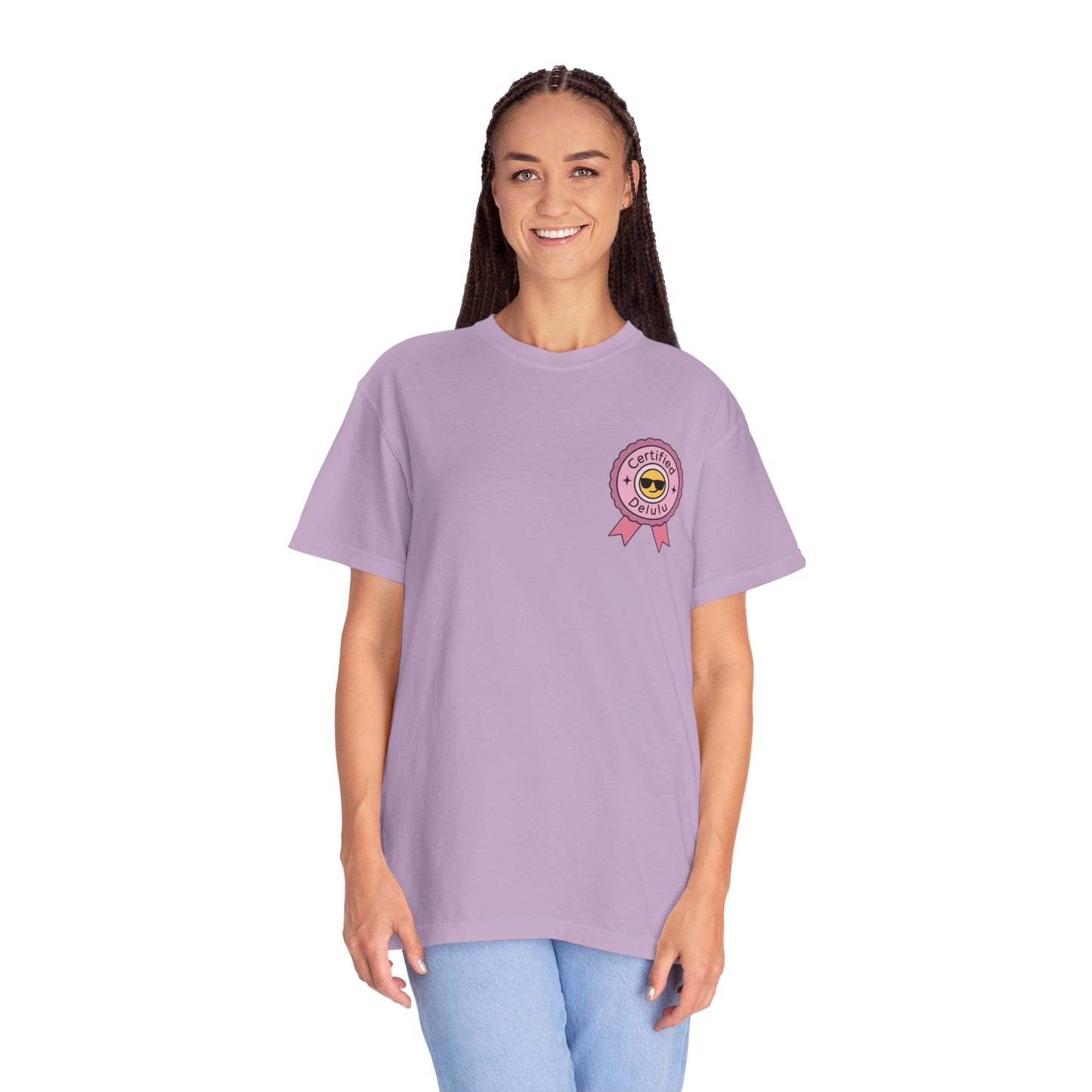 Vibrant indoor shot of the Certified Delulu Badge Comfort Tee, highlighting its unisex appeal for everyone embracing comfort and whimsy.