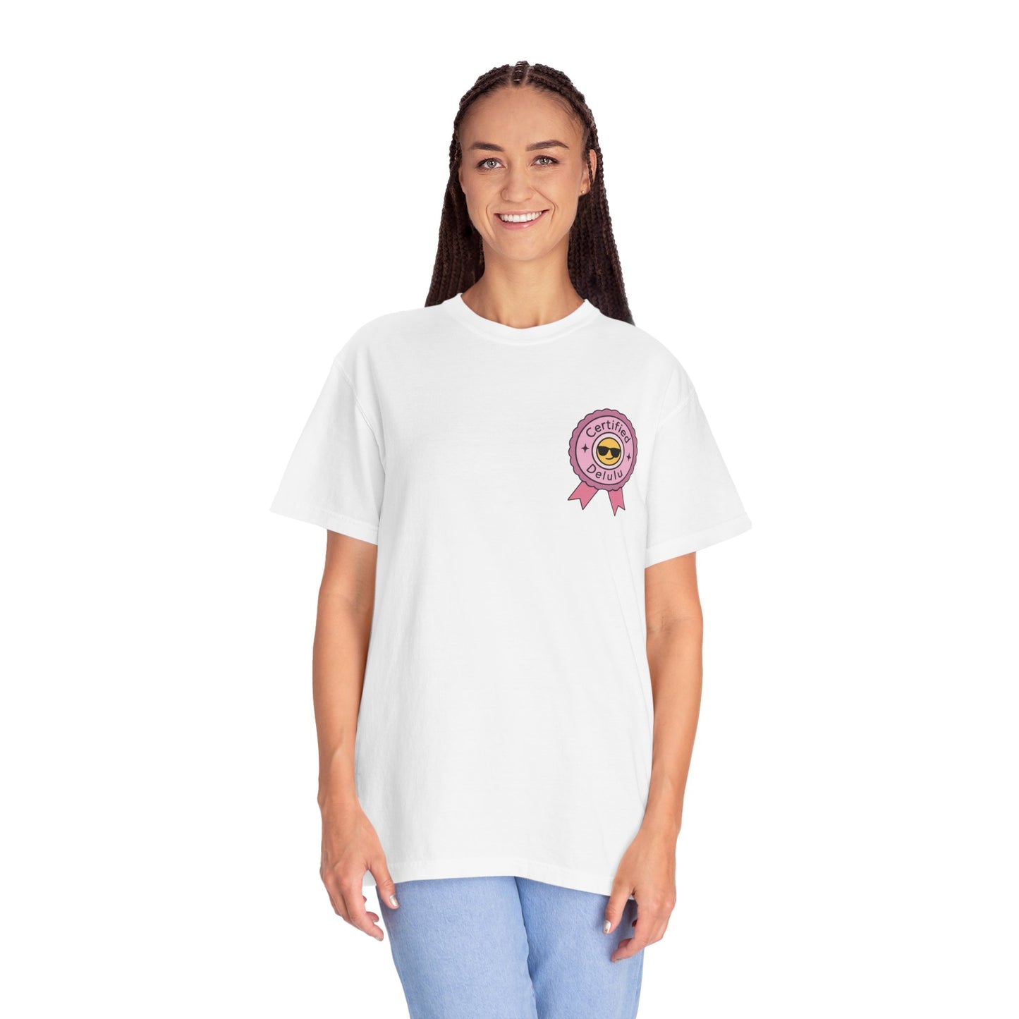 Flat lay of the Certified Delulu Badge Comfort Tee with accessories, perfect for Instagram aesthetic shots and subtle meme flexing.