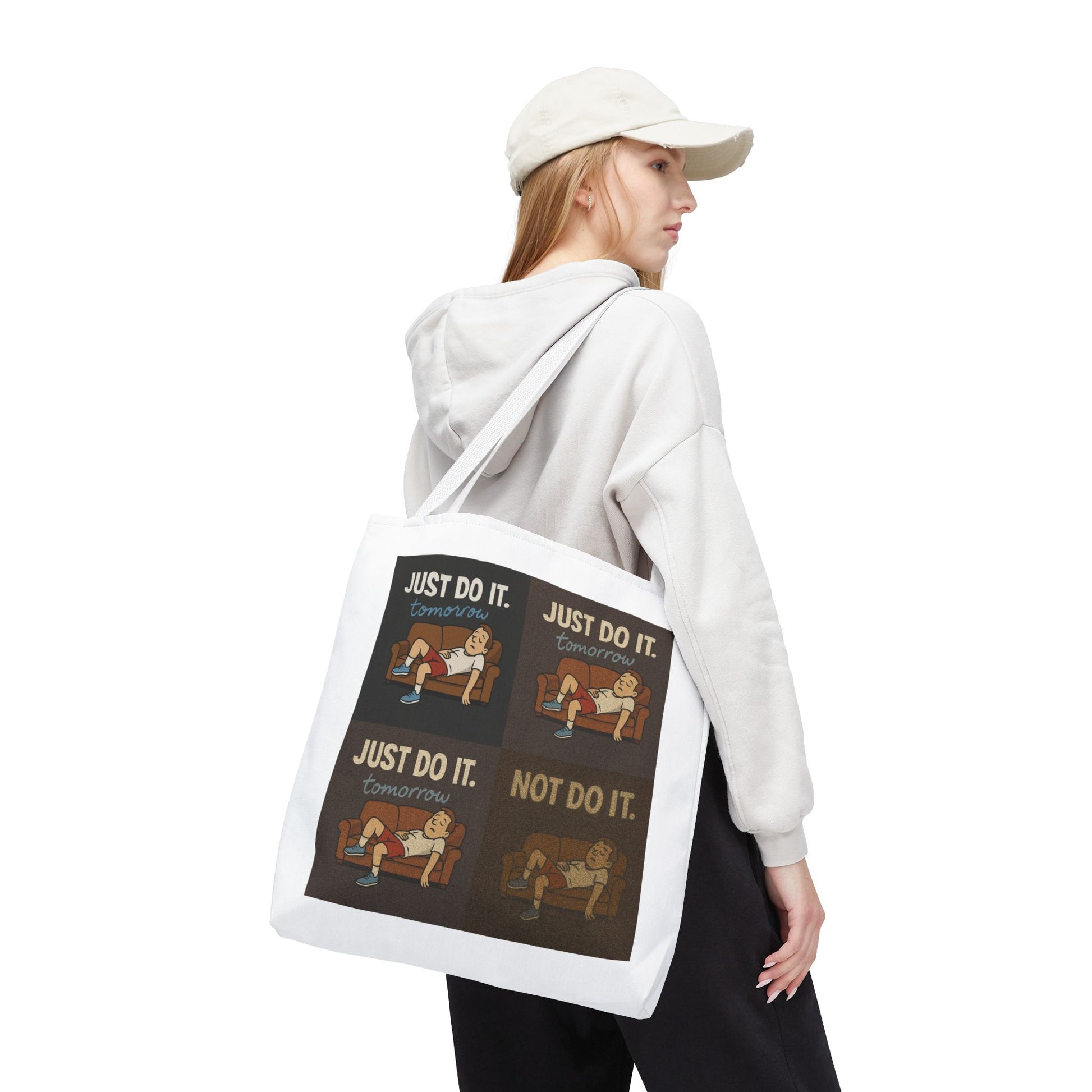 Delightful view of 'Just Do It… Tomorrow' tote bag layered over a messy desk.